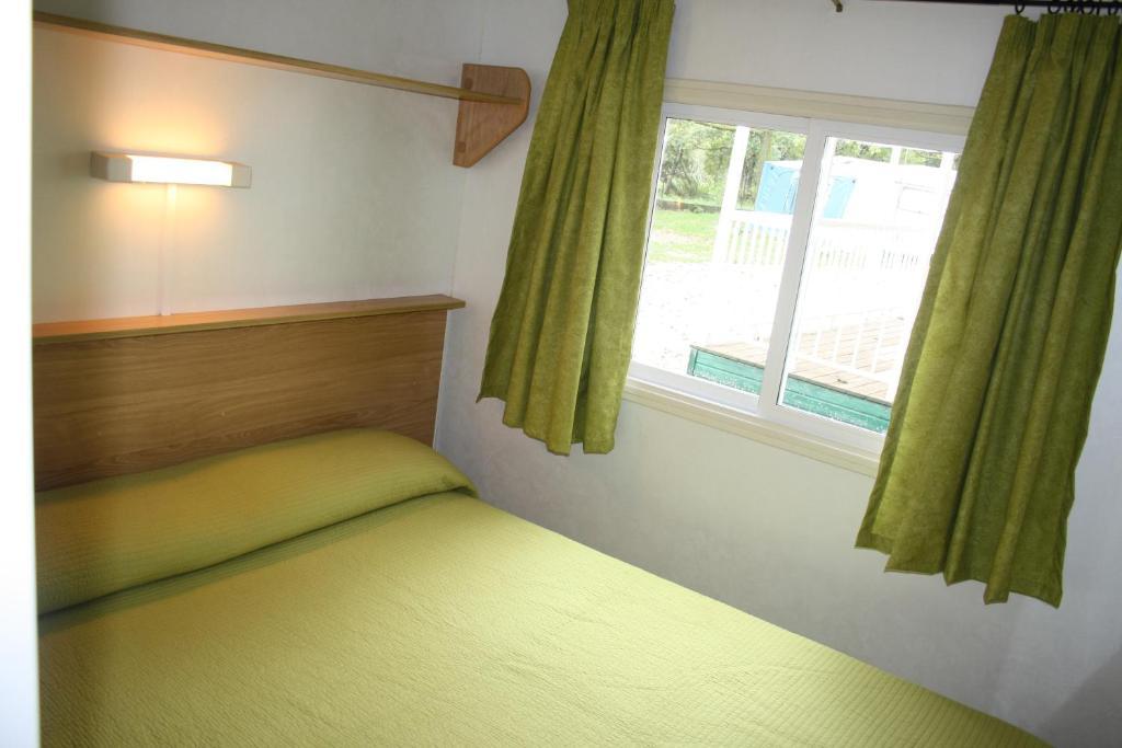 Bungalows Conca De Ter Vilallonga de Ter Bilik gambar